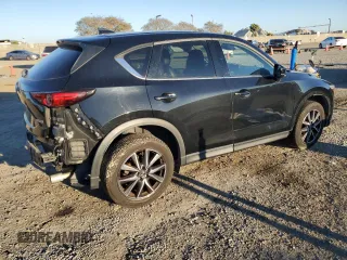 2018 Mazda CX-5 Grand Touring with VIN JM3KFBDMXJ0318474, listed as a Copart auction lot 46438545 with 58,702 mi miles and Salvage Title. Bid and sale history available at DreamBid. Image 3.