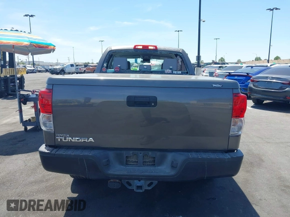 2013 Toyota Tundra z VIN 5TFRM5F15DX053654, wystawiony jako IAAI lot #42324593 z przebiegiem 128 206 mil mil oraz . Historia ofert i sprzedaży dostępna na DreamBid. Obrazek 16.