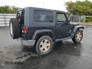 2009 Jeep Wrangler Sahara with VIN 1J4FA54109L702963, listed as a Copart auction lot 89211555 with 125,138 mi miles and Clean title. Bid and sale history available at DreamBid. Image 3.