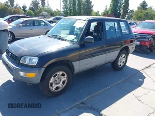 1999 Toyota RAV4 with VIN JT3GP10V6X7061242, listed as a IAAI auction lot 42639695 with 338,937 mi miles and . Bid and sale history available at DreamBid. Image 2.