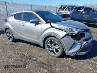 2018 Toyota C-HR XLE with VIN NMTKHMBX4JR035415, listed as a IAAI auction lot 41823751 with 75,566 mi miles. Bid and sale history available at carsss.com. Image 1.