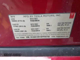 2013 Tesla Model S with VIN 5YJSA1CN1DFP09756, listed as a IAAI auction lot 41921720 with 94,770 mi miles. Bid and sale history available at carsss.com. Image 9.