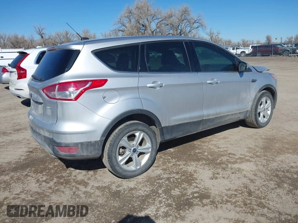 2015 Ford Escape SE with VIN 1FMCU9GX4FUB07459, listed as a IAAI auction lot 41731063 with 101,070 mi miles. Bid and sale history available at carsss.com. Image 4.