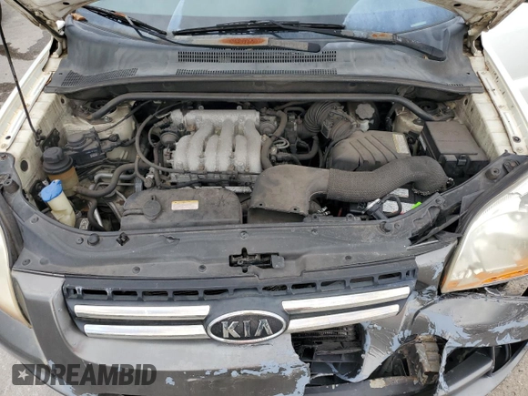2005 Kia Sportage LX with VIN KNDJF723557078730, listed as a Copart auction lot 79823504 with 166,509 mi miles and Salvage Title. Bid and sale history available at carsss.com. Image 12.