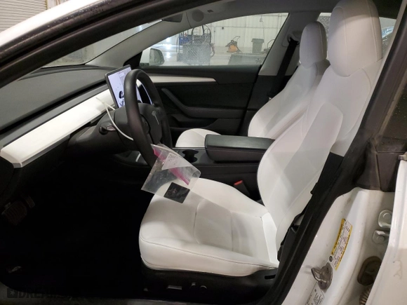 2021 Tesla Model 3 Long Range with VIN 5YJ3E1EB9MF046898, listed as a Copart auction lot 54666255 with 144,370 mi miles and Clean Title. Bid and sale history available at carsss.com. Image 7.
