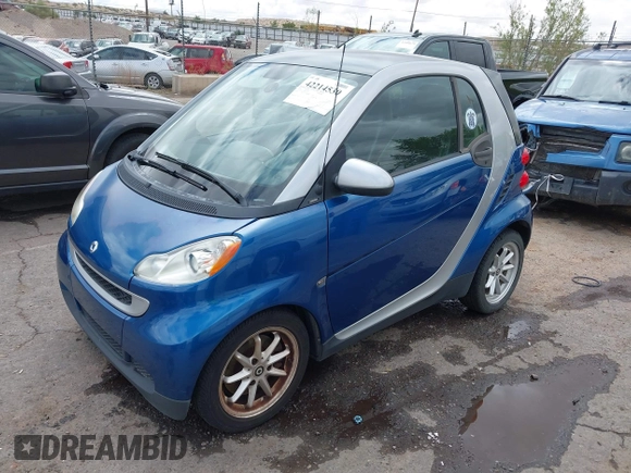 2008 Smart fortwo Pure with VIN WMEEJ31X88K167241, listed as a IAAI auction lot 42214530 with 75,289 mi miles and . Bid and sale history available at DreamBid. Image 2.