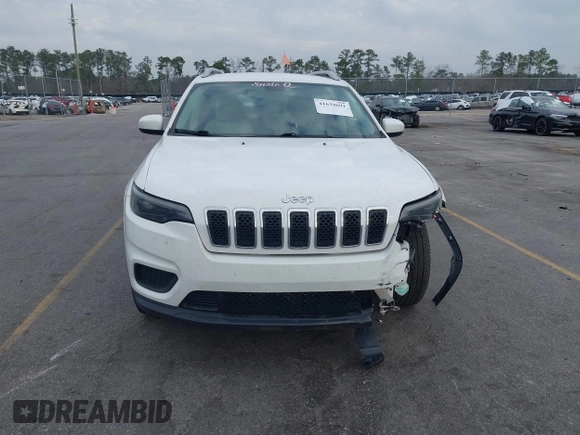 2020 Jeep Cherokee Latitude with VIN 1C4PJLCB5LD618650, listed as a IAAI auction lot 41634691 with 90,341 mi miles. Bid and sale history available at carsss.com. Image 12.