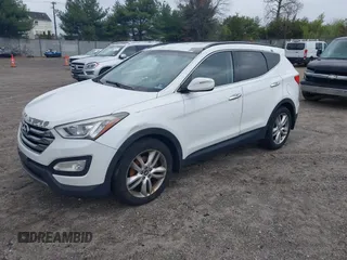 2013 Hyundai Santa Fe Sport z VIN 5XYZUDLA8DG079795, wystawiony jako IAAI lot #42035743 z przebiegiem 170 321 mil mil oraz . Historia ofert i sprzedaży dostępna na DreamBid. Obrazek 2.