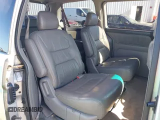 2004 Honda Odyssey EX-L with VIN 5FNRL18974B057715, listed as a IAAI auction lot 41762518 with 193,626 mi miles and . Bid and sale history available at DreamBid. Image 8.