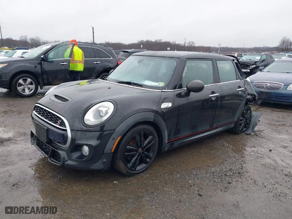 2018 MINI Hardtop 4 Door Cooper S with VIN WMWXU3C58J2F51097, listed as a IAAI auction lot 41567892 with 133542 miles. Bid and sale history available at carsss.com. Image 2.