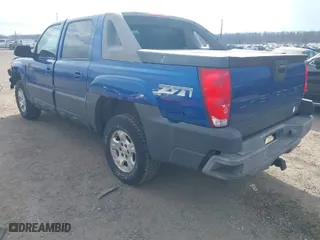 2003 Chevrolet Avalanche with VIN 3GNEK13T23G131174, listed as a IAAI auction lot 41649059 with 230,943 mi miles. Bid and sale history available at carsss.com. Image 3.