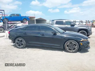 2022 Kia K5 GT-Line z VIN 5XXG64J29NG164454, wystawiony jako IAAI lot #42102282 z przebiegiem 43 367 mil mil oraz . Historia ofert i sprzedaży dostępna na DreamBid. Obrazek 14.