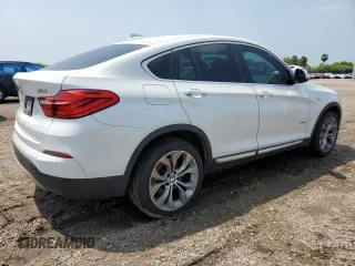 2018 BMW X4 xDrive28i z VIN 5UXXW3C51J0Y65775, wystawiony jako Copart lot #54046785 z przebiegiem 94 287 mil mil oraz Szkoda całkowita • Salvage title. Historia ofert i sprzedaży dostępna na DreamBid. Obrazek 3.