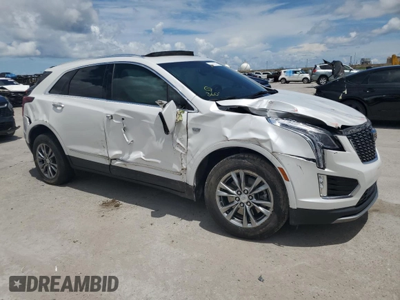 2021 Cadillac XT5 FWD Premium Luxury z VIN 1GYKNCR44MZ106982, wystawiony jako Copart lot #62234455 z przebiegiem 93 079 mil mil oraz Szkoda całkowita • Salvage title. Historia ofert i sprzedaży dostępna na DreamBid. Obrazek 4.