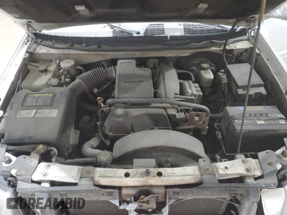 2003 GMC Envoy SLE z VIN 1GKDT13S632156357, wystawiony jako Copart lot #41398035 z przebiegiem 160 338 mil mil oraz Szkoda całkowita • Salvage title. Historia ofert i sprzedaży dostępna na DreamBid. Obrazek 12.