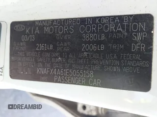 2014 Kia Forte LX with VIN KNAFX4A61E5055158, listed as a IAAI auction lot 42212501 with 224,830 mi miles and . Bid and sale history available at carsss.com. Image 9.