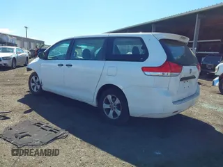 2012 Toyota Sienna with VIN 5TDZK3DC7CS203993, listed as a IAAI auction lot 41130289 with 177,059 mi miles. Bid and sale history available at carsss.com. Image 3.