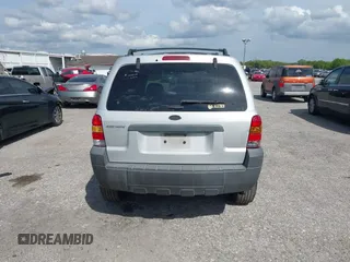 2005 Ford Escape XLS Value with VIN 1FMYU02Z35KD87671, listed as a IAAI auction lot 41880824 with 278,689 mi miles. Bid and sale history available at carsss.com. Image 16.