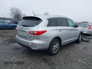 2015 Infiniti QX60 with VIN 5N1AL0MM4FC554511, listed as a IAAI auction lot 41065737 with 205,077 mi miles and . Bid and sale history available at DreamBid. Image 4.