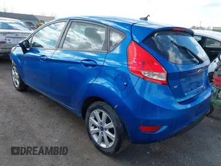 2011 Ford Fiesta SE with VIN 3FADP4EJ0BM173576, listed as a IAAI auction lot 42075691 with 128,835 mi miles. Bid and sale history available at carsss.com. Image 3.