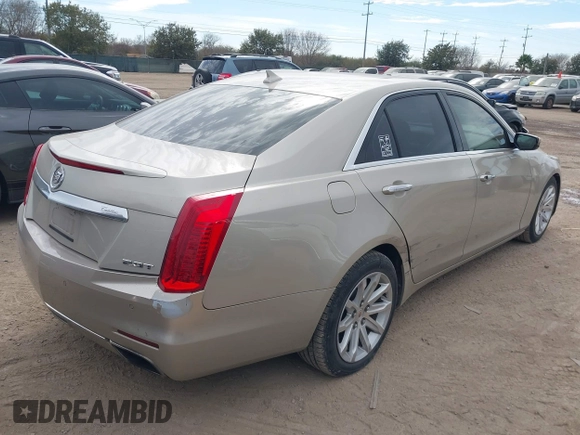 2014 Cadillac CTS Luxury RWD with VIN 1G6AR5SX6E0132580, listed as a IAAI auction lot 41349654 with 113,157 mi miles. Bid and sale history available at carsss.com. Image 4.