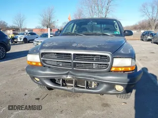 2002 Dodge Dakota Sport with VIN 1B7GL32X52S564722, listed as a IAAI auction lot 41455669 with 211,890 mi miles. Bid and sale history available at carsss.com. Image 6.