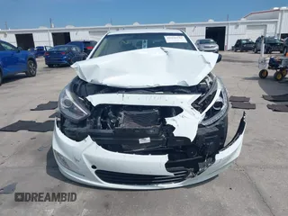 2014 Hyundai Accent GLS with VIN KMHCU4AE6EU766796, listed as a IAAI auction lot 41933743 with 99,142 mi miles. Bid and sale history available at carsss.com. Image 12.