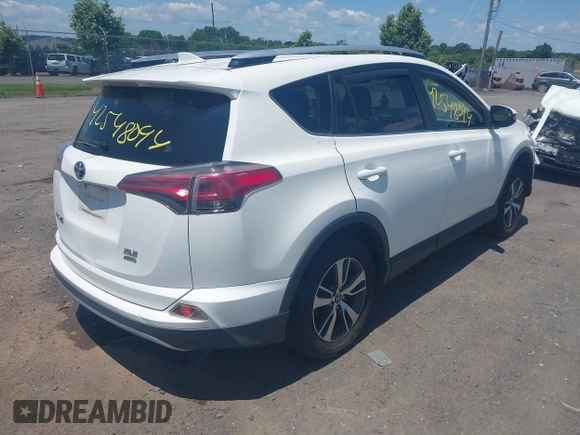 2016 Toyota RAV4 XLE with VIN JTMRFREV0GJ073114, listed as a IAAI auction lot 42548094 with 119,431 mi miles and . Bid and sale history available at DreamBid. Image 4.