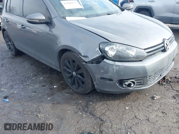 2012 Volkswagen Golf TDI with VIN WVWDM7AJ1CW205186, listed as a IAAI auction lot 41468253 with 150,991 mi miles and . Bid and sale history available at DreamBid. Image 6.