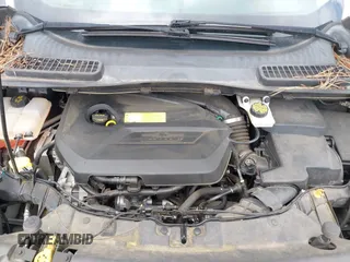 2015 Ford Escape Titanium с VIN 1FMCU0JXXFUB10676, выставлен на аукционе IAAI как лот 42412073 с пробегом 129 737 миль миль и . История ставок и продаж доступна на DreamBid. Изображение 10.