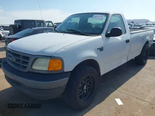 2004 Ford F-150 XL with VIN 2FTRF17WX4CA74272, listed as a IAAI auction lot 42657638 with 119,928 mi miles and . Bid and sale history available at DreamBid. Image 2.