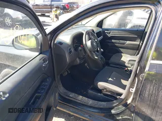 2014 Jeep Compass Sport with VIN 1C4NJDBB0ED567592, listed as a IAAI auction lot 41696070 with 150,303 mi miles. Bid and sale history available at carsss.com. Image 5.