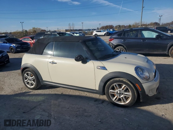 2015 MINI Convertible S with VIN WMWZP3C52FT708377, listed as a Copart auction lot 79817344 with 54,466 mi miles and Salvage title. Bid and sale history available at DreamBid. Image 4.