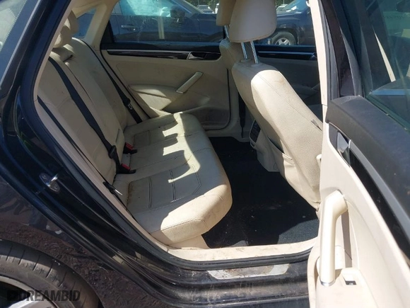 2019 Volkswagen Passat 2.0T SE R-Line with VIN 1VWMA7A37KC009597, listed as a IAAI auction lot 40548963 with 97,378 mi miles. Bid and sale history available at carsss.com. Image 8.