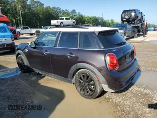 2016 MINI Hardtop 4 Door S z VIN WMWXU3C52G2B67552, wystawiony jako Copart lot #55983245 z przebiegiem 85 180 mil mil oraz Szkody całkowita. Historia ofert i sprzedaży dostępna na DreamBid. Obrazek 2.