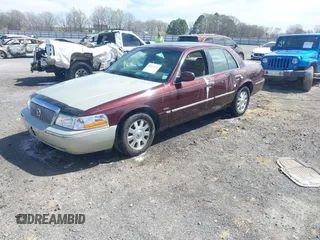 2003 Mercury Grand Marquis LS Premium z VIN 2MEFM75W73X650193, wystawiony jako IAAI lot #41803310 z przebiegiem 151 719 mil mil oraz . Historia ofert i sprzedaży dostępna na DreamBid. Obrazek 17.