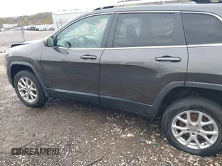 2014 Jeep Cherokee Altitude with VIN 1C4PJMCB7EW232678, listed as a IAAI auction lot 40812147 with 105,828 mi miles. Bid and sale history available at carsss.com. Image 15.