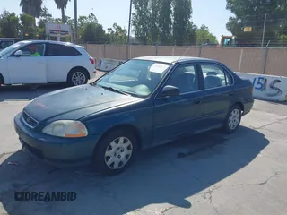 1998 Honda Civic LX z VIN 2HGEJ6672WH563664, wystawiony jako IAAI lot #42400327 z przebiegiem 200 390 mil mil oraz . Historia ofert i sprzedaży dostępna na DreamBid. Obrazek 6.