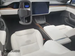 2021 Tesla Model S Long Range с VIN 5YJSA1E50MF452893, выставлен на аукционе Copart как лот 54139865 с пробегом 56 410 миль миль и Списание • Salvage title. История ставок и продаж доступна на DreamBid. Изображение 8.