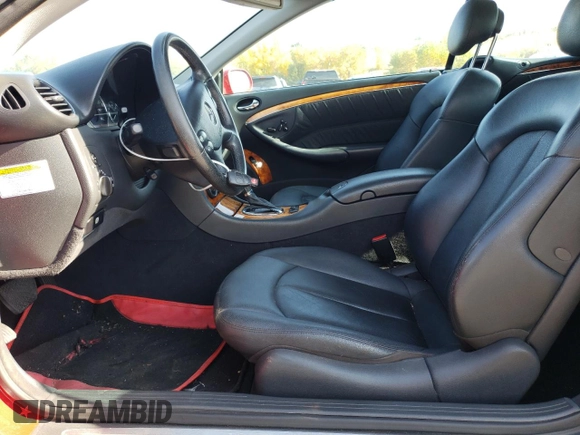 2005 Mercedes-Benz CLK 500 with VIN WDBTK75J55F163229, listed as a Copart auction lot 76276354 with 76,829 mi miles and Salvage Title. Bid and sale history available at DreamBid. Image 7.