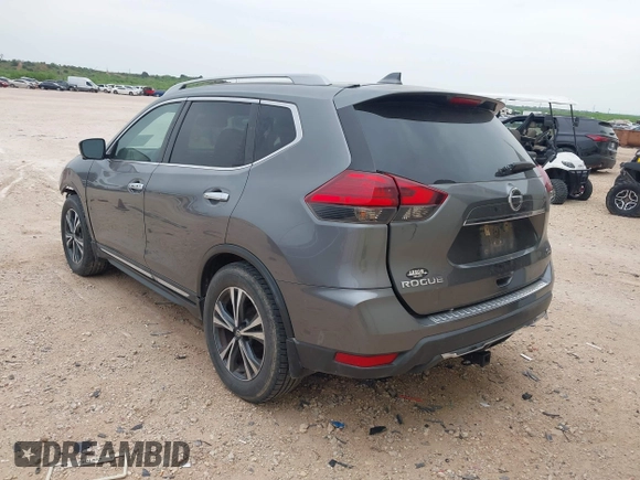 2017 Nissan Rogue SV with VIN 5N1AT2MT0HC889383, listed as a IAAI auction lot 42073498 with 319,134 mi miles and . Bid and sale history available at DreamBid. Image 3.