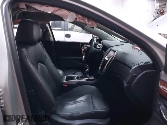 2014 Cadillac SRX Luxury Collection z VIN 3GYFNEE36ES679505, wystawiony jako IAAI lot #41817608 z przebiegiem 62 351 mil mil oraz . Historia ofert i sprzedaży dostępna na DreamBid. Obrazek 5.