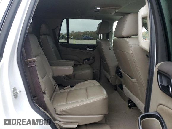 2020 GMC Yukon SLT with VIN 1GKS1BKC3LR168874, listed as a Copart auction lot 82103464 with 79,220 mi miles and Salvage Title. Bid and sale history available at DreamBid. Image 11.