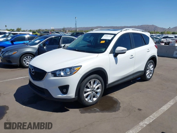 2015 Mazda CX-5 Grand Touring with VIN JM3KE2DYXF0493370, listed as a IAAI auction lot 42087156 with 161,464 mi miles. Bid and sale history available at carsss.com. Image 17.