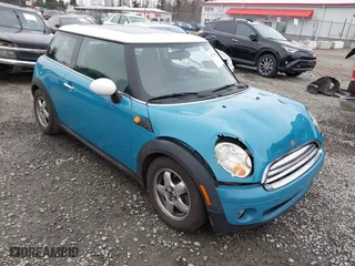 2009 MINI Cooper Hardtop with VIN WMWMF33569TW70413, listed as a IAAI auction lot 41776589 with 85,394 mi miles. Bid and sale history available at carsss.com. Image 1.