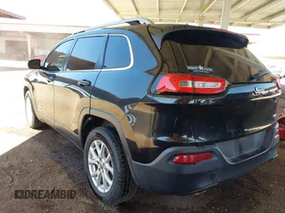 2015 Jeep Cherokee Latitude with VIN 1C4PJLCB8FW669150, listed as a IAAI auction lot 42122669 with 194,525 mi miles and . Bid and sale history available at DreamBid. Image 3.