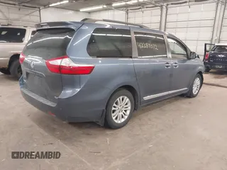 2016 Toyota Sienna XLE with VIN 5TDYK3DC3GS747411, listed as a IAAI auction lot 42289072 with 184,546 mi miles and . Bid and sale history available at DreamBid. Image 4.