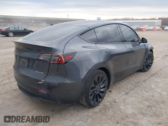 2023 Tesla Model Y Performance with VIN 7SAYGDEF2PF757113, listed as a IAAI auction lot 41881175 with 54,809 mi miles and . Bid and sale history available at DreamBid. Image 4.