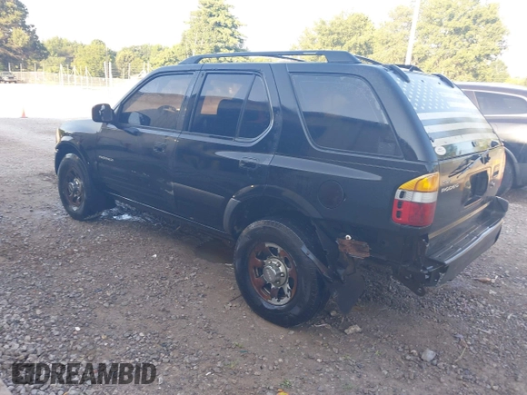 1998 Isuzu Rodeo with VIN 4S2CK58DXW4316412, listed as a IAAI auction lot 42785298 with 262,478 mi miles and . Bid and sale history available at DreamBid. Image 3.