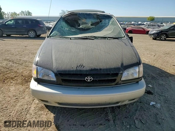 2000 Toyota Sienna LE with VIN 4T3ZF13C5YU287280, listed as a Copart auction lot 71397554 with 162,851 mi miles and Clean Title. Bid and sale history available at carsss.com. Image 12.
